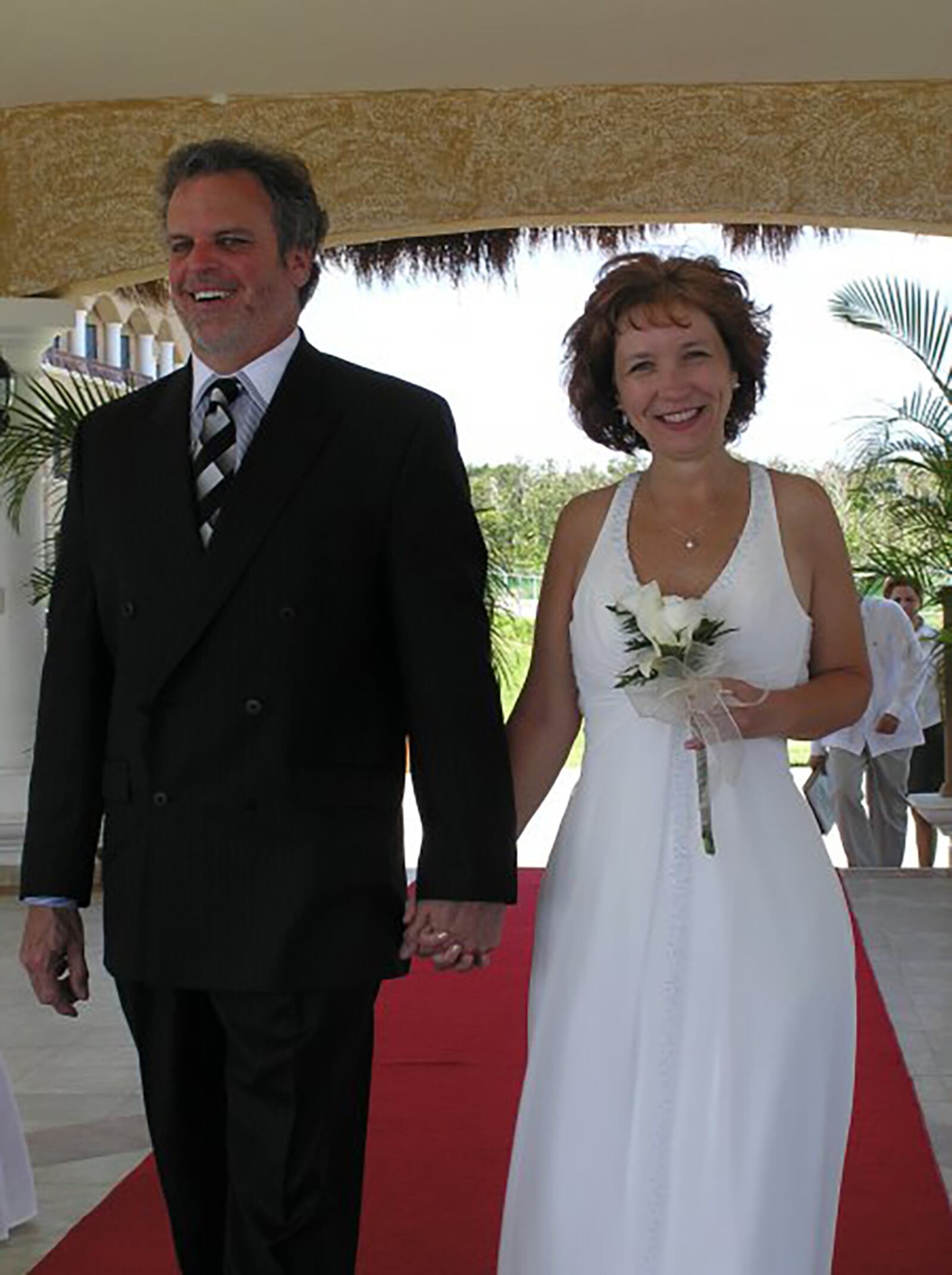 Paul (L) and Betsy Westhafer on their wedding day in 2006. The couple blended a family of five teenagers.