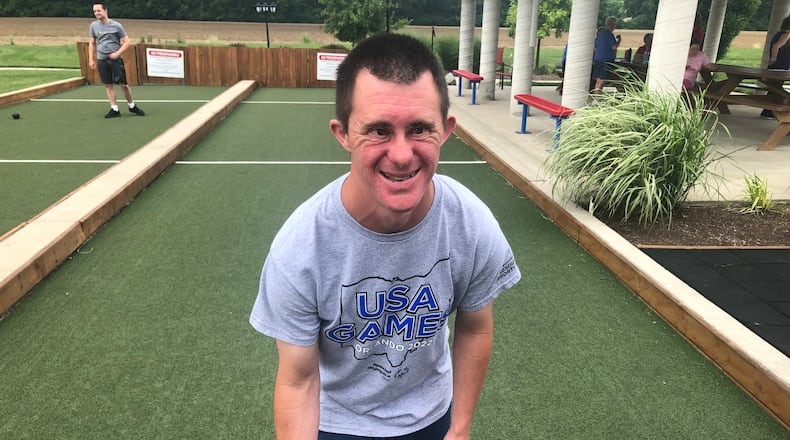 Adam Gibbemeyer, 39, of Ross Twp., is competing in bocce this week at the 2022 USA Games in Orlando. He practices at the Joe Nuxhall Miracle League Fields in Fairfield. RICK McCRABB/STAFF