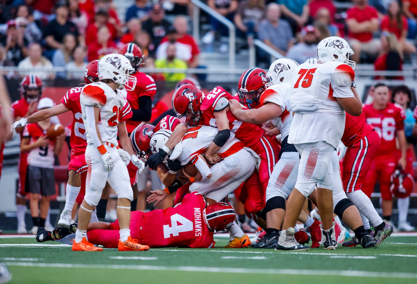 Madison defense tackles National Trail quarterback during their football game Thursday, Sept. 7, 2023 at Madison High School. Madison won 34-7. NICK GRAHAM/STAFF