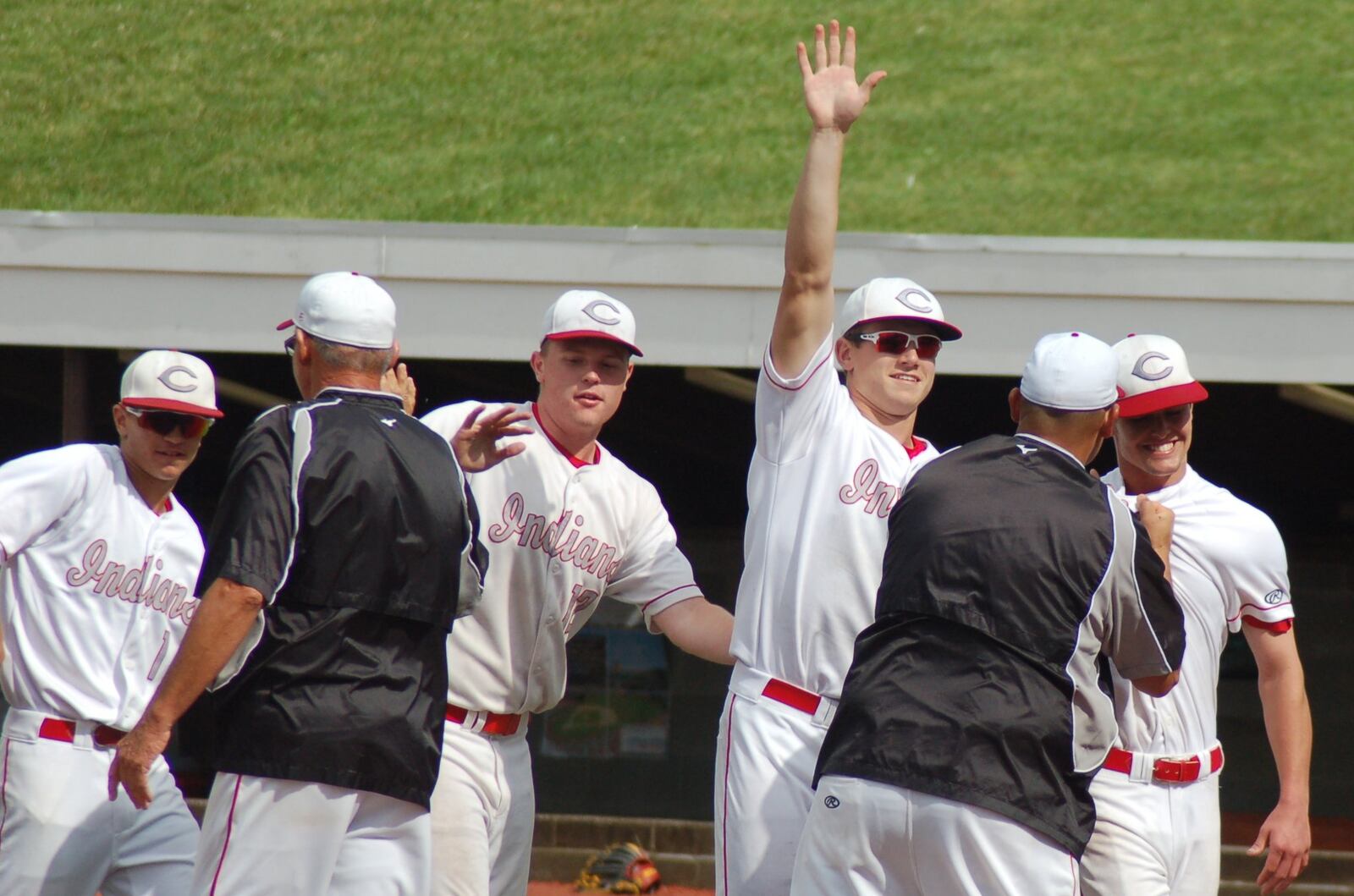 Adam Goodpaster (far right) and Caleb Boy (with arm raised) were among the Carlisle players celebrating Thursday after the Indians beat Cincinnati Country Day 2-0 in a Division III regional semifinal at the Athletes in Action complex in Xenia. CONTRIBUTED PHOTO BY JOHN CUMMINGS