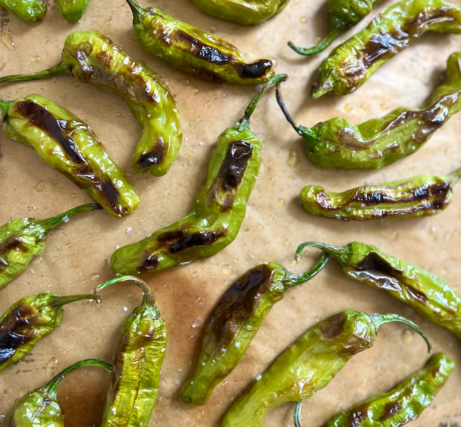 Blistering Shishito Peppers require simple preparation and take exactly 8 minutes, you hardly need a recipe, and they accommodate nearly every dietary restriction. WHITNEY KLING/CONTRIBUTED