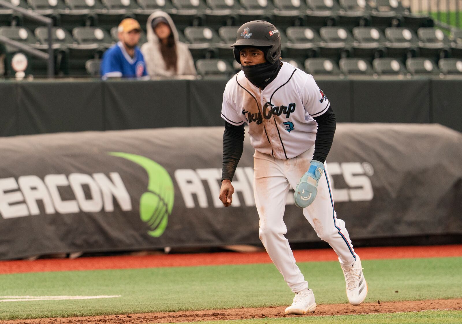 In this undated image provided by the Beloit Sky Carp, Sky Carp's Emaarion Boyd takes a lead off base during a minor league baseball game. (Ty McElroy/Beloit Sky Carp via AP)