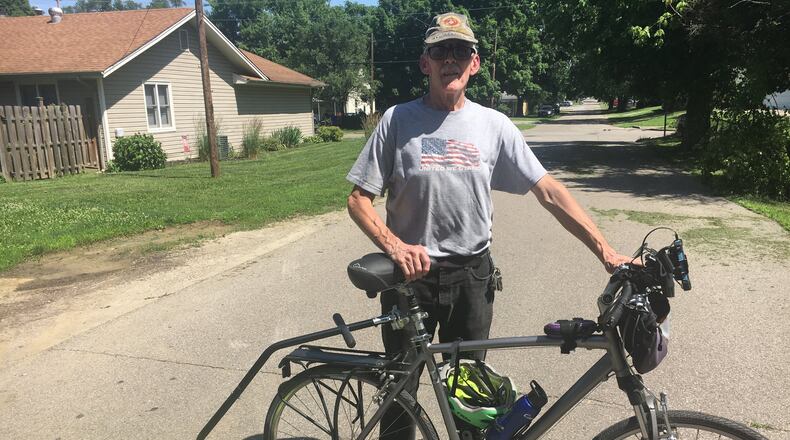 Michael McCracken, 67, of Hamilton, rode his 21-speed bike 450 miles from Butler County to Michigan and back to raise money and awareness about the MDA. RICK McCRABB/STAFF