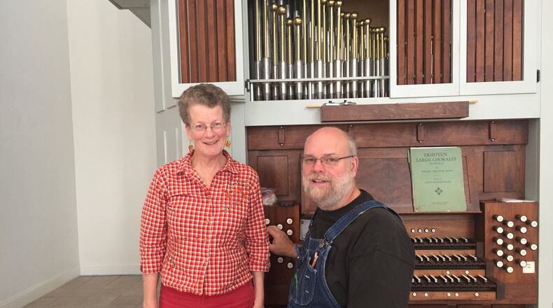 Sarah Michael, chairwoman of Holy Trinity’s Organ Committee, with Paul Nordlie, the brother of the builder of the Oxford church’s pipe organ. CONTRIBUTED