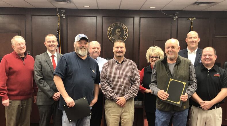 Two Franklin residents, Thomas Roach and William “Tommy” Roberts, recently received a proclamation for their heroic service to the community that deserves special recognition.Mayor Todd Hall recognized both men for their courageous action on Nov. 16 in assisting Officer Patrick Holland apprehend a suspect who was possibly overdosing on drugs who tried to run away, fight, resist and disarm the officer. Roach and Roberts assisted Holland until additional police officers arrived at the McDonald’s restaurant.From left, Councilman Paul Ruppert, Vice Mayor Brent Centers, Thomas Roach, Councilman Denny Centers, Mayor Todd Hall, Councilwoman Debbie Fouts, William “Tommy” Roberts, Councilman Michael Aldridge, and Councilman Matt Wilcher. CONTRIBUTED
