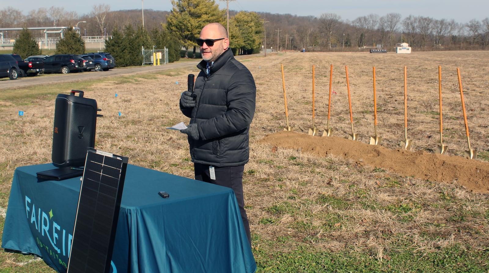 Fairfield's assistant city manager Adam Sackenheim spoke at a groundbreaking ceremony at the site of Fairfield's first solar array field, a project he is overseeing. The array will be erected on five acres just east of the Groh Lane wastewater treatment plant between it and the Joe Nuxhall Miracle League fields. CONTRIBUTED/SUE KIESEWETTER