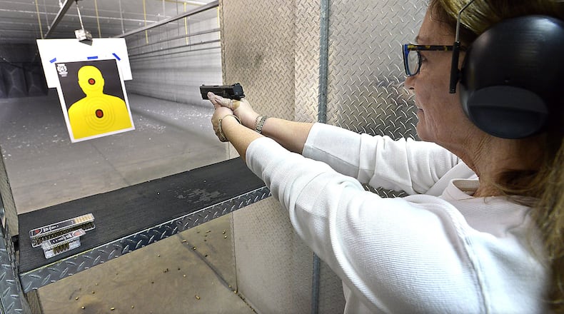 Pam Oliver practices shooting at the Miami Valley Shooting Grounds in Spirngfield in this file photo. Since June 2022 when the law eliminating some gun carrying restrictions took effect, more than 30,021 new licenses have been issued statewide and 134,113 permits were renewed, according to Ohio Attorney General Dave Yost’s office. Bill Lackey/Staff