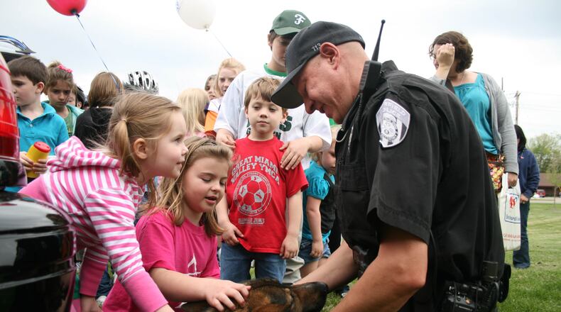 Officer John Cresap is seen in 2011 with police dog Ketcher. For 18 of Cresap’s 22 years with the Fairfield Police Department, he has been one of the K9 handlers. FILE