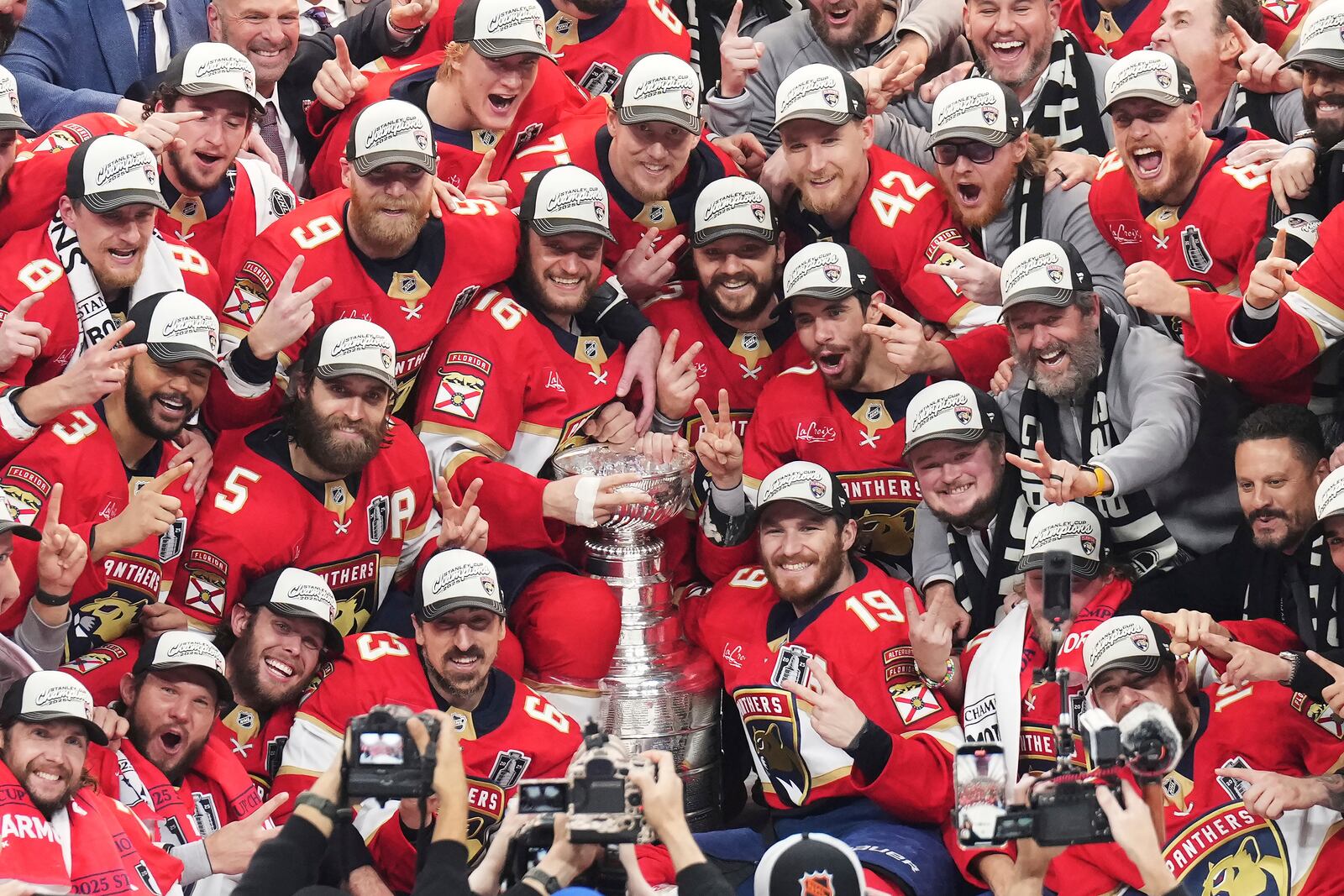 The Florida Panthers celebrate with the Stanley Cup after defeating the Edmonton Oilers in Game 6 of the NHL hockey Stanley Cup Final in Sunrise, Fla., Tuesday, June 17, 2025. (Nathan Denette/The Canadian Press via AP)