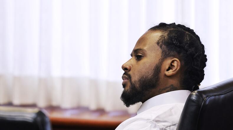 Marquan Cook sits for his trial Tuesday, Dec. 14, 2021 in Butler County Common Pleas Court charged in the shooting death of Brandon Frank Nathanial Moneyham Sr. In 2020 in a parking lot outside the 513 Lounge on Verity Parkway. NICK GRAHAM / STAFF