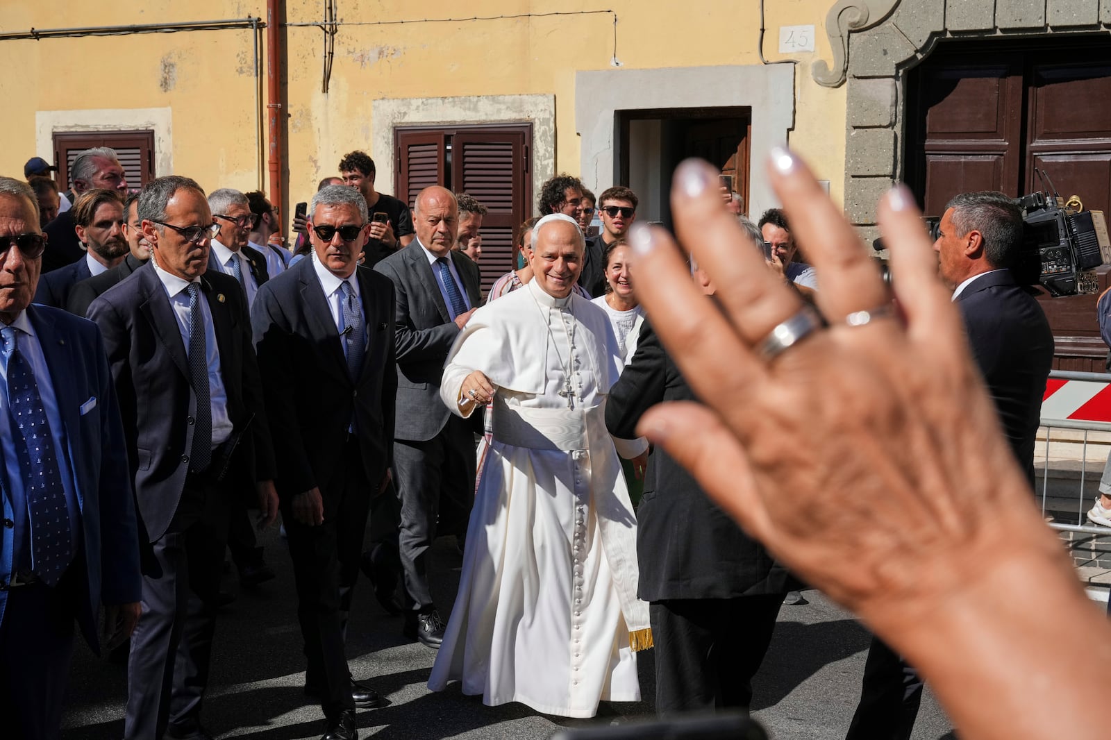 Pope Leo XIV arrives at the papal summer residence in Castel Gandolfo south of Rome for a six-week vacation, Sunday. (AP Photo/Andrew Medichini)