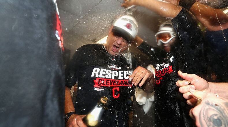 BOSTON, MA - OCTOBER 10: Manager Terry Francona of the Cleveland Indians celebrates with players in the clubhouse after defeating the Boston Red Sox 4-3 in game three of the American League Divison Series to advance to the American League Championship Series at Fenway Park on October 10, 2016 in Boston, Massachusetts. (Photo by Elsa/Getty Images)
