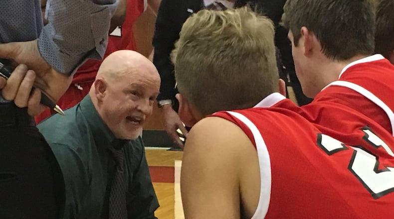 Jeff Smith, former boys basketball coach at Madison High School, says he's honored to have the court named after him. The ceremony will take place between the junior varsity and varsity game Dec. 3 when the Mohawks host Arcanum in their home opener. FILE PHOTO