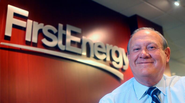 FILE - In this 2015 file photo, FirstEnergy Corp. President and CEO Charles "Chuck" Jones appears at the company's Akron, Ohio headquarters. Federal authorities say FirstEnergy bankrolled an alleged $60 million bribery scheme to win a legislative bailout for two Ohio nuclear plants approved in the Ohio Legislature. Two attorneys, under order from a federal judge to reveal the names, wrote in a court document that former FirstEnergy CEO Chuck Jones and senior vice president Michael Dowling were responsible for the company's role. (Phil Masturzo/Akron Beacon Journal via AP, File)
