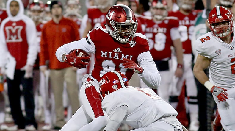 Contributed photo by E.L. Hubbard Miami RedHawk wide receiver James Gardner tries to get past Ball State safety Corey Hall during their MAC contest at Yager Stadium in Oxford Tuesday, Nov. 22, 2016.