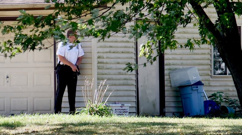 Hamilton police were searching for a suspect in a pursuit that began in the area of St. Clair and Pleasant on Thursday, Sept. 26, 2019. NICK GRAHAM / STAFF