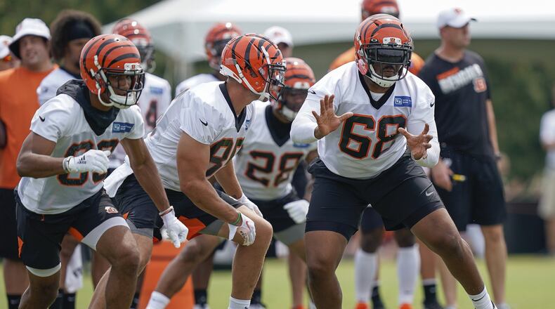 Cincinnati Bengals offensive tackle Bobby Hart (68) runs a play during NFL football training camp, Monday, July 29, 2019, in Cincinnati. (AP Photo/Bryan Woolston)