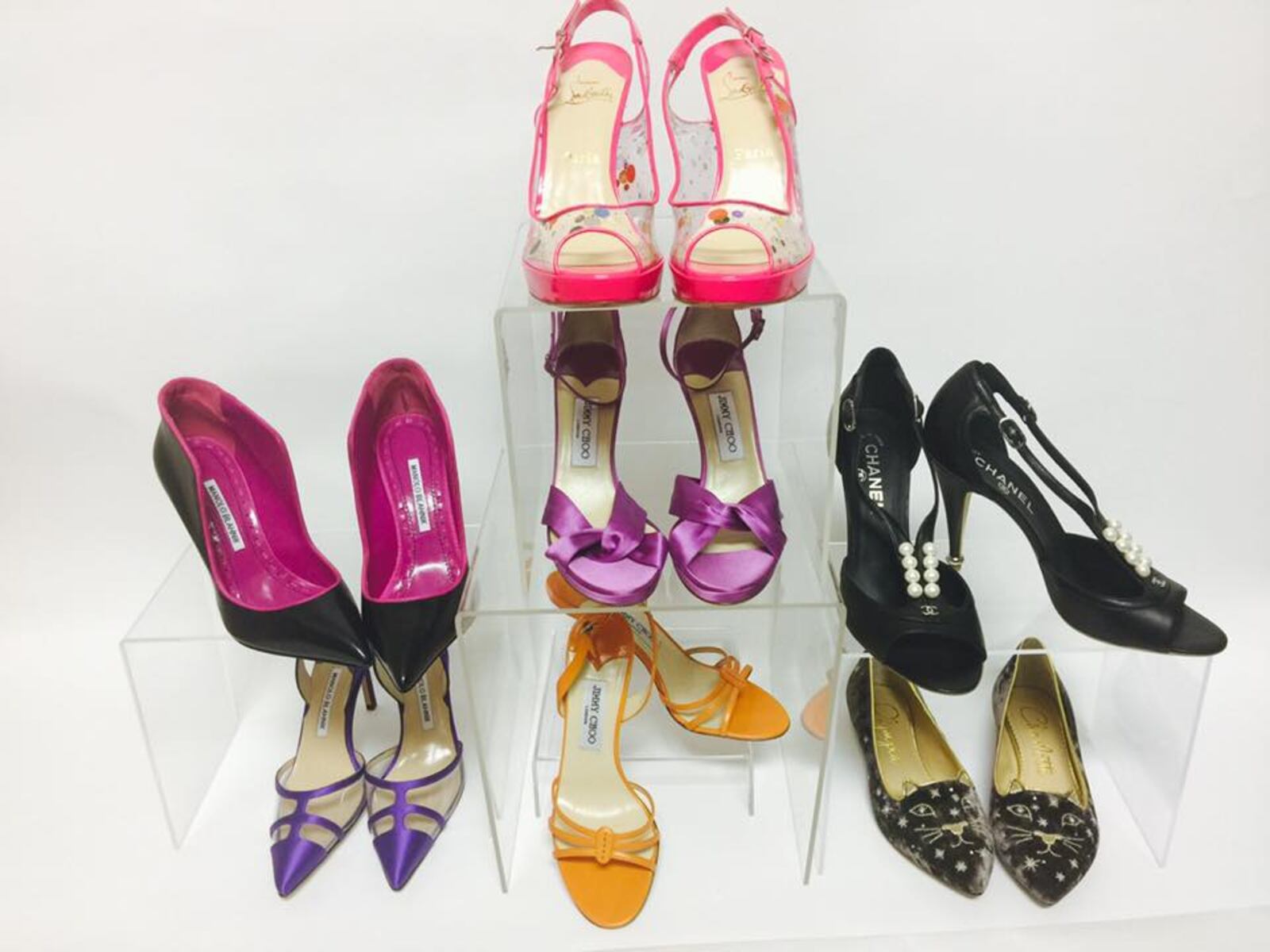 Designers Items and More, located at 8919 Brookside Ave. in West Chester Twp., specializes in high-end, new, pre-owned, and vintage couture designer clothes, and shoes and accessories. 