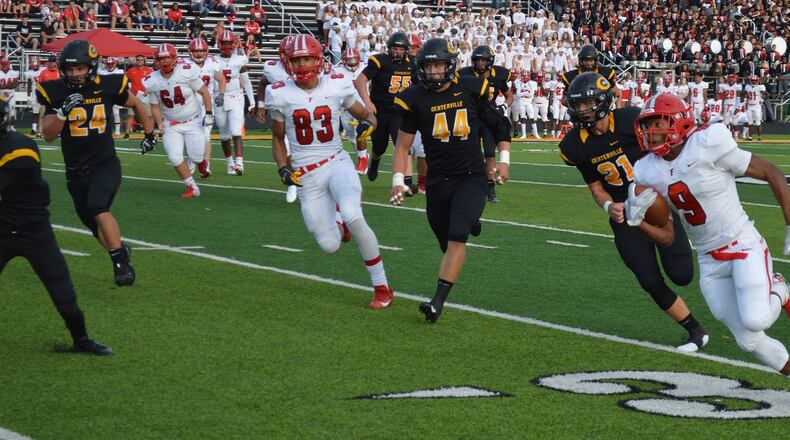 Fairfield’s JuTahn McClain (9) sprints around the Centerville defense during Friday night’s game at Centerville Stadium. CONTRIBUTED PHOTO BY ERIC FRANTZ