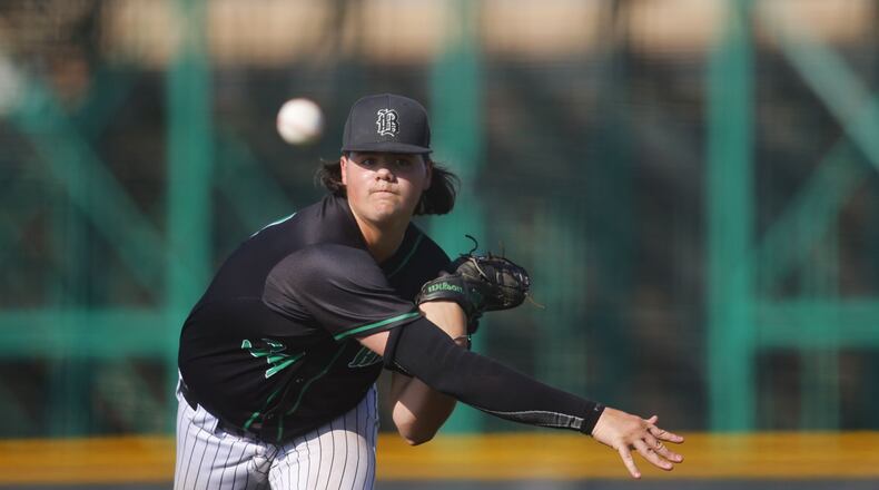 Badin's Justin Hoevel pitches during their 9-2 division II regional semifinal baseball game against Hebron Lakewood Thursday, June 1, 2023 in Mason. NICK GRAHAM/STAFF
