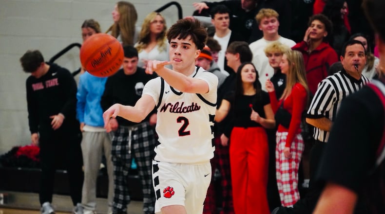 Franklin's Kai Cook (2) passes the ball against Madison on Friday night. Chris Vogt/CONTRIBUTED
