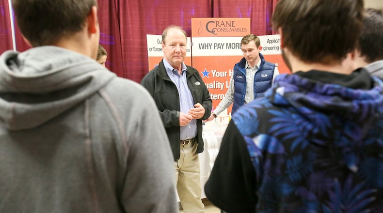 Robert Crane of Crane Consumables talks to students from Edgewood High School about careers with his company during a Career Showcase as part of the the Chamber of Commerce serving Middletown, Monroe & Trenton All American Business & Careers Expo, Thursday, March 23 at Miami University Middletown. GREG LYNCH / STAFF