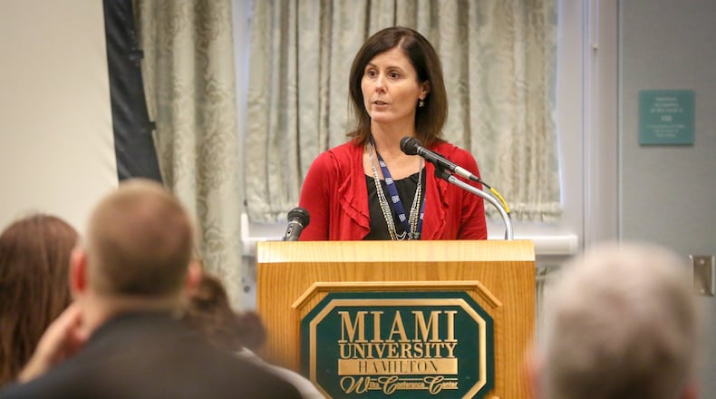 The Butler County Opiate Task Force and Mental Health & Addiction Recovery Services sponsored an alcohol and drug treatment forum at Miami University Hamilton, Wilks Conference Center, Friday, Dec. 2, 2016. Representatives from local drug treatment facilities, including Kim Guy, Director of Business Development for Beckett Springs, talked about what kind of treatment is available for addicts. GREG LYNCH / STAFF