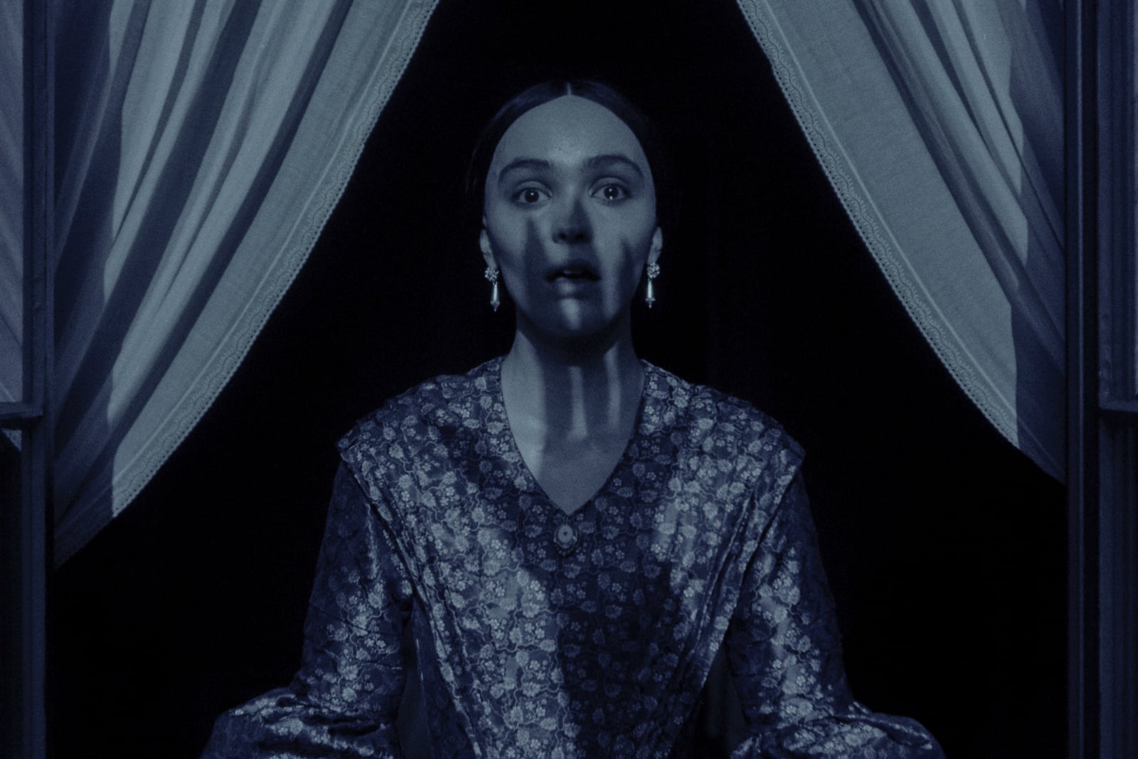 This image released by Focus Features shows Lily-Rose Depp in a scene from "Nosferatu." (Focus Features via AP)
