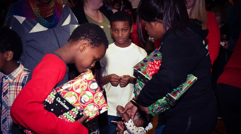 More than 500 children received presents during the 10th annual Feed the Hungry Christmas party Sunday afternoon at the Middletown YMCA.