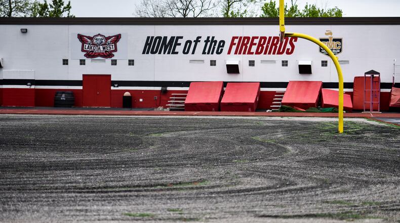 The artificial turf has been removed at Lakota West High School for a turf replacement process. Lakota West and Lakota East are both in the process of replacing turf on the football fields. NICK GRAHAM / STAFF