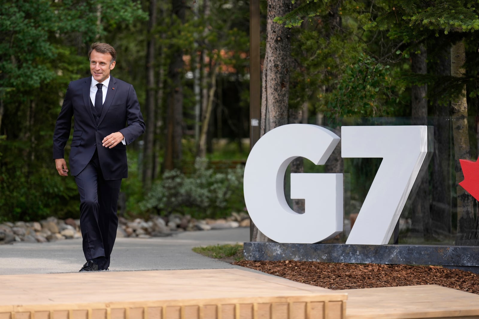 France's President Emmanuel Macron arrives during the official welcome of the G7 Summit, Monday, June 16, 2025, in Kananaskis, Canada. (AP Photo/Mark Schiefelbein)