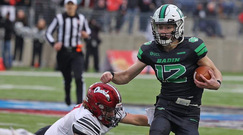 Badin's Alex Ritzie avoids a tackle from Chardon's Heath Fetchik in last year's state championship game in Canton. BILL LACKEY/STAFF FILE