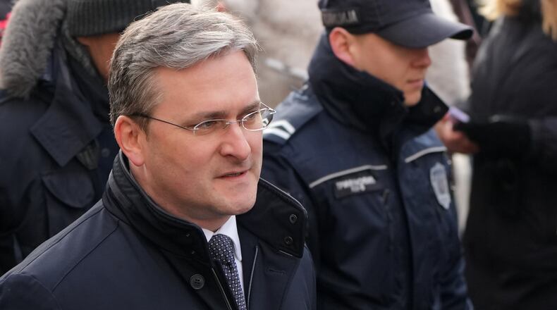 Serbia culture Minister Nikola Selakovic, charged with abuse of office and falsifying of documents to help pave the way for a real estate project that was to be financed by a company of Jared Kushner, U.S. President Donald Trump's son-in-law, arrives in the court building in Belgrade, Serbia, Wednesday, Feb. 4, 2026. (AP Photo/Darko Vojinovic)