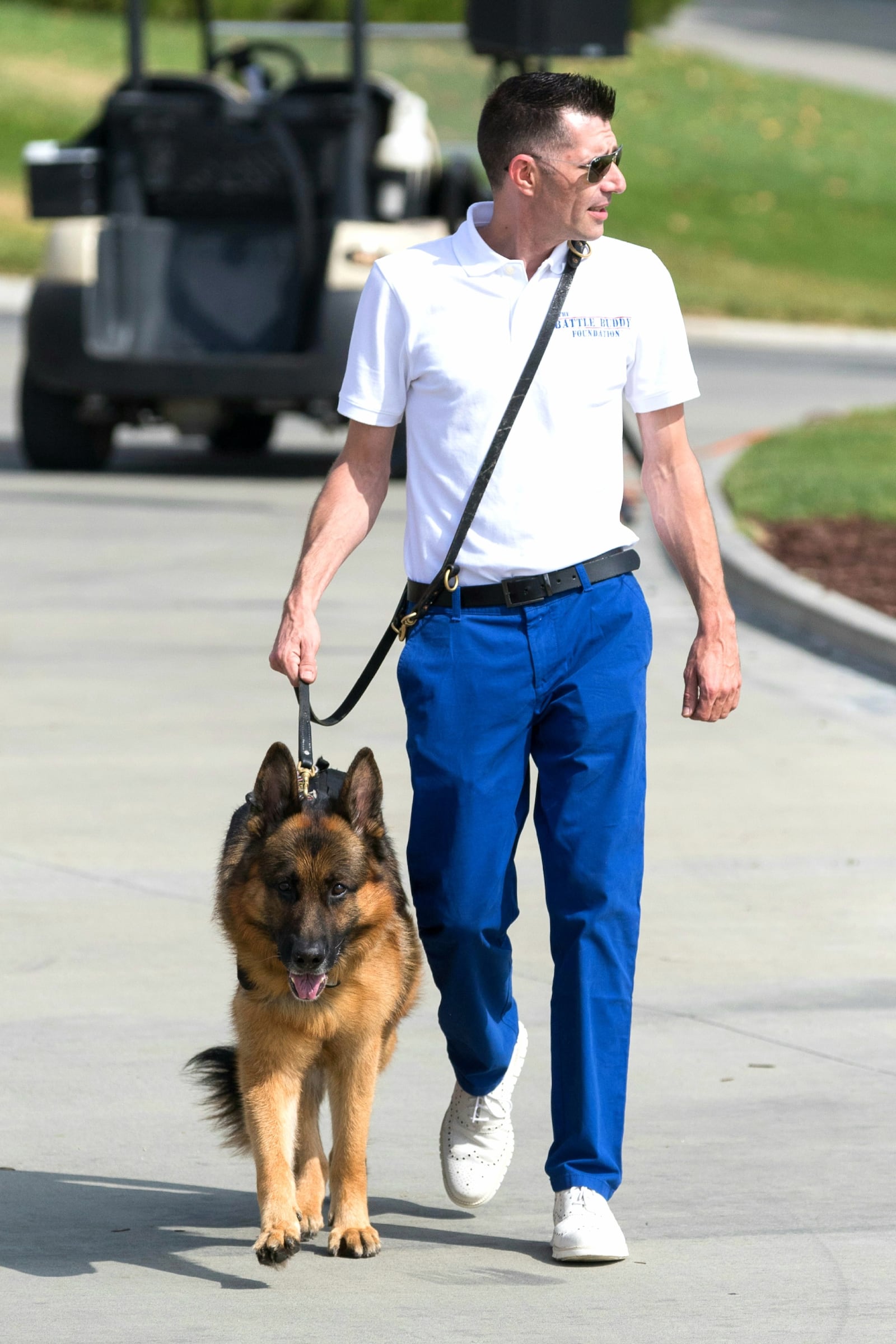 Kenny Bass, co-founder of The Battle Buddy Foundation, with Atlas the Wonderdog. Photo by Brian Kramer