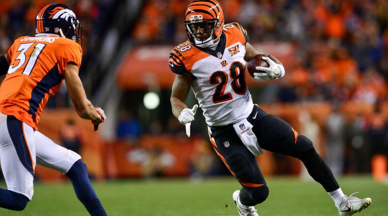 DENVER, CO - NOVEMBER 19: Running back Joe Mixon #28 of the Cincinnati Bengals rushes against the Denver Broncos at Sports Authority Field at Mile High on November 19, 2017 in Denver, Colorado. (Photo by Dustin Bradford/Getty Images)