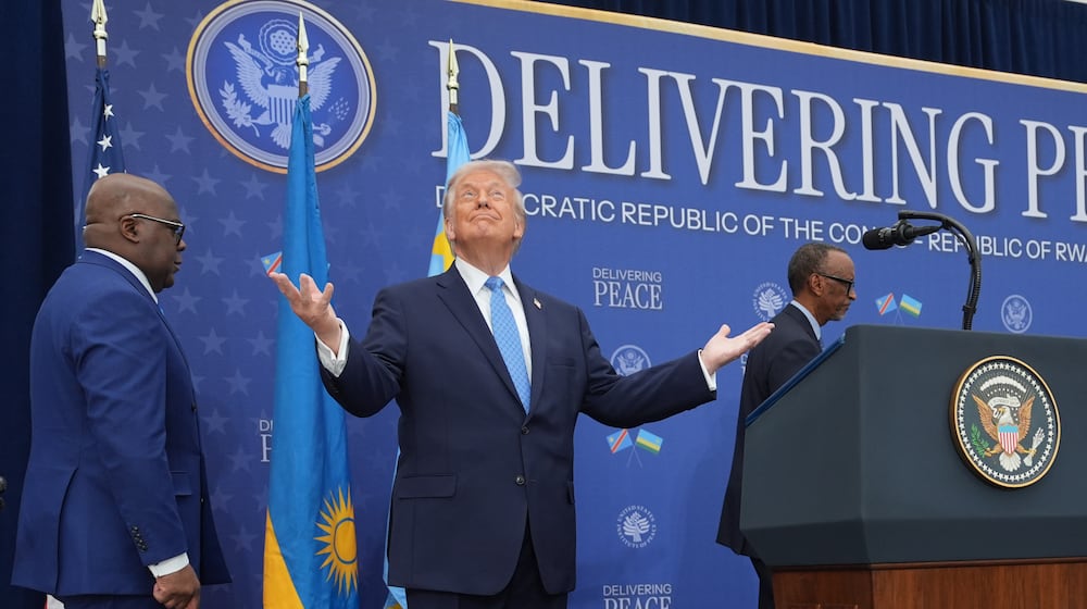 President Donald Trump arrives for a signing ceremony with Rwanda's President Paul Kagame and Democratic Republic of Congo President Felix-Antoine Tshisekedi at the Donald J. Trump Institute of Peace, Thursday, Dec. 4, 2025, in Washington. (AP Photo/Evan Vucci)