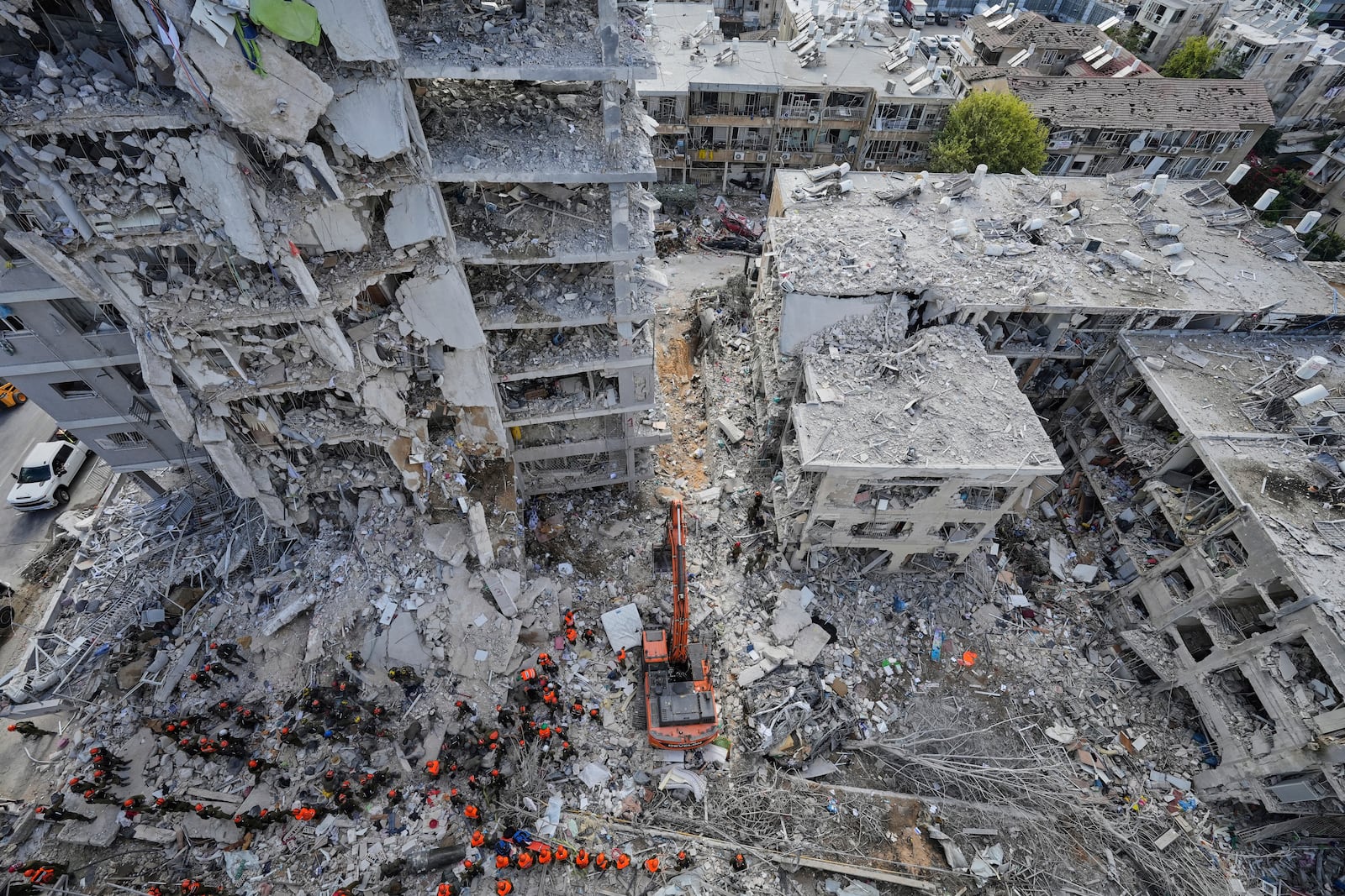 Israeli soldiers search through the rubble of residential buildings destroyed by an Iranian missile strike in Bat Yam, central Israel, on Sunday, June 15, 2025. (AP Photo/Baz Ratner)