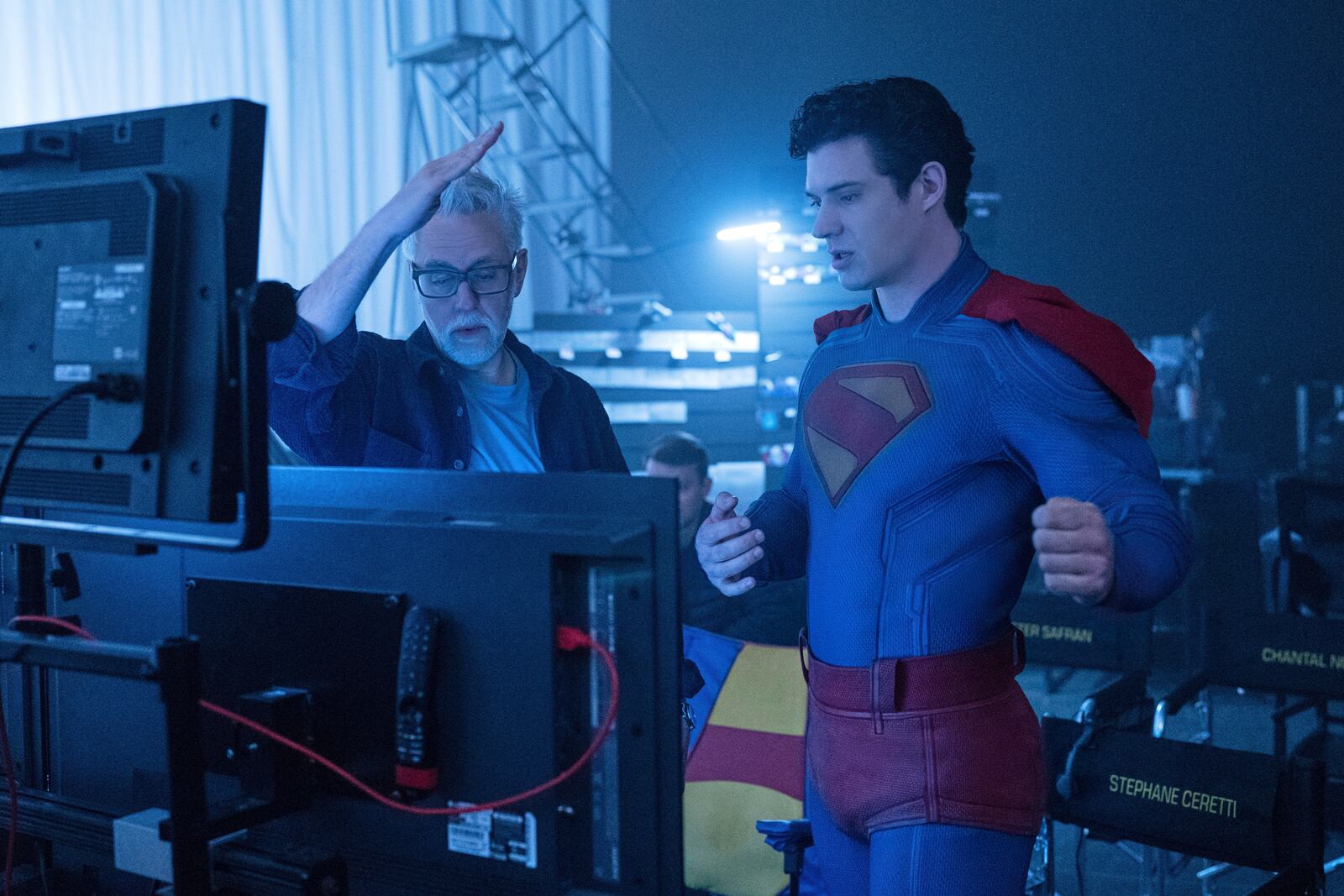 This image released by Warner Bros. Pictures shows David Corenswet, right, and director James Gunn on the set of "Superman." (Jessica Miglio/Warner Bros. Pictures via AP)