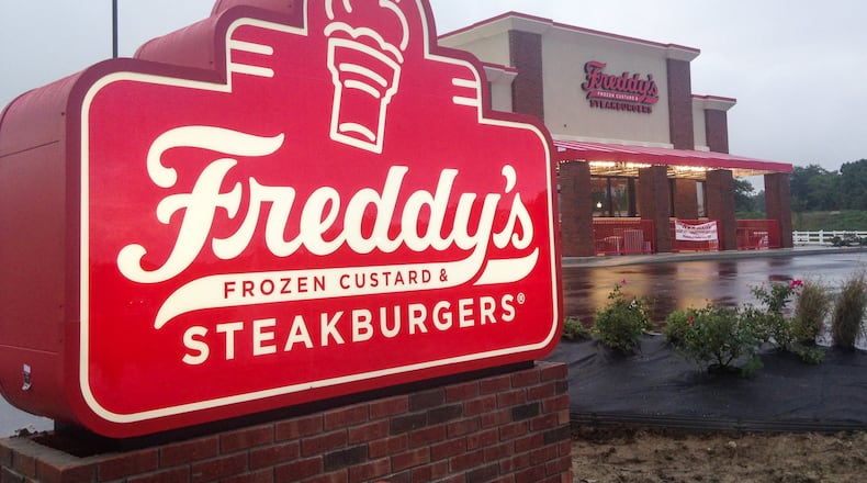 Work continues Friday, Sept 30, 2016, on Freddy’s Frozen Custard & Steakburgers, which will open in late October at 7615 Trailside Drive in West Chester Twp. in front of Cabela’s. Menu highlights from the family-friendly restaurant chain with a presence in 30 states nationwide include lean ground beef steakburgers, Vienna Beef hot dogs and shoestring fries, as well as custard treats prepared with freshly churned chocolate or vanilla frozen custard. ERIC SCHWARTZBERG/STAFF