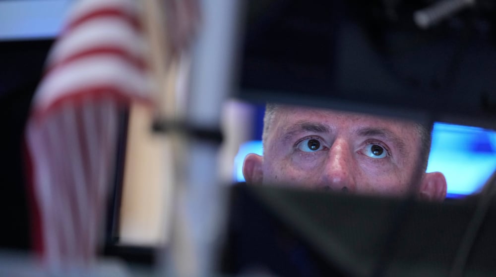 Traders work on the floor at the New York Stock Exchange in New York, Tuesday, March 10, 2026. (AP Photo/Seth Wenig)