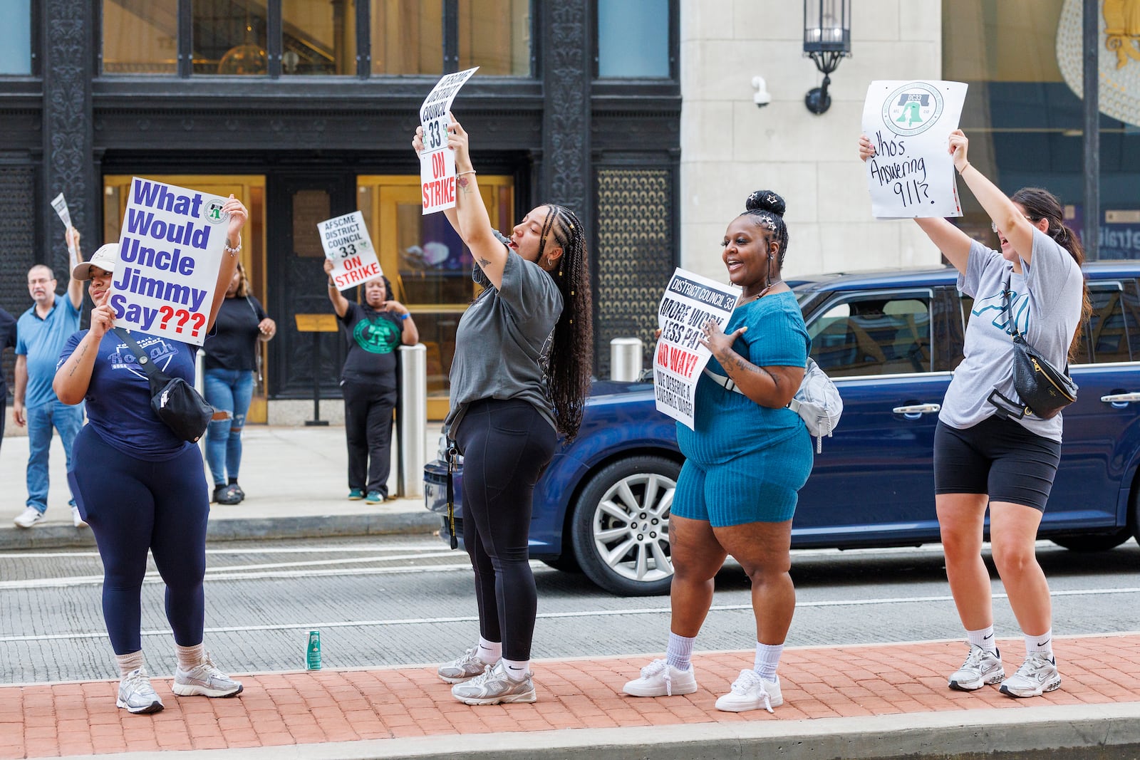 Philadelphia municipal workers, AFSCME District Council 33, strike outside police headquarters on Tuesday, July 1, 2025 in Philadelphia, Pa. (Alejandro A Alvarez /The Philadelphia Inquirer via AP)