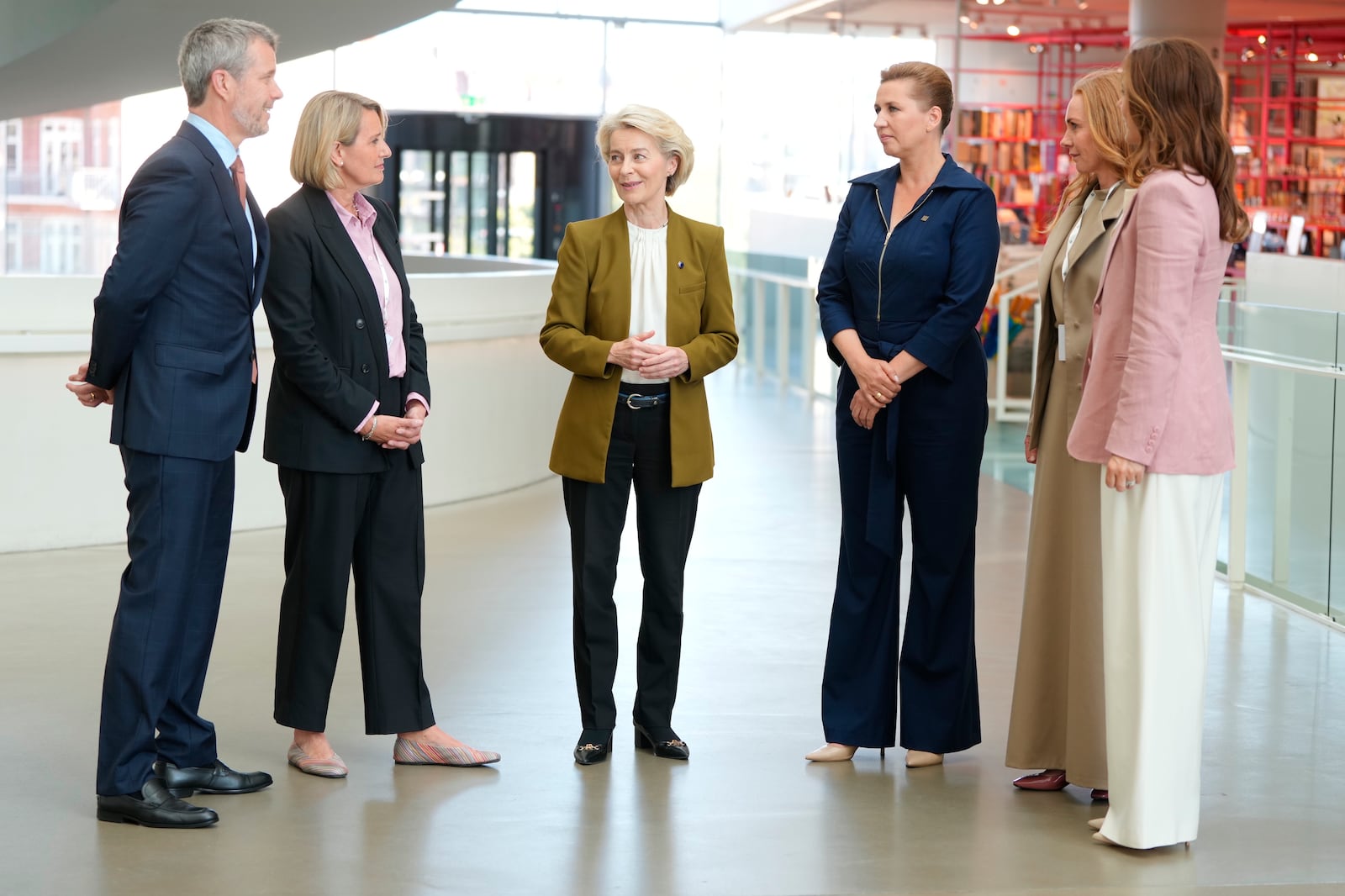 From left, Denmark's King Frederik, museum director Rebecca Matthew, European Commission President Ursula von der Leyen, Denmark's Prime Minister Mette Frederiksen and Denmark's Queen Mary speak, during the official opening of Denmark's EU presidency in Aarhus, Denmark, Thursday July 3, 2025. (Liselotte Sabroe/Ritzau Scanpix via AP)