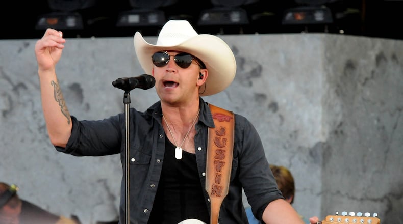 Justin Moore performs on the main stage at Country Concert 17 on Thursday, July 6. The three-day country music festival at Hickory Hills Lake in Fort Loramie runs through Saturday, July 8. David A. Moodie, Contributing Photographer.