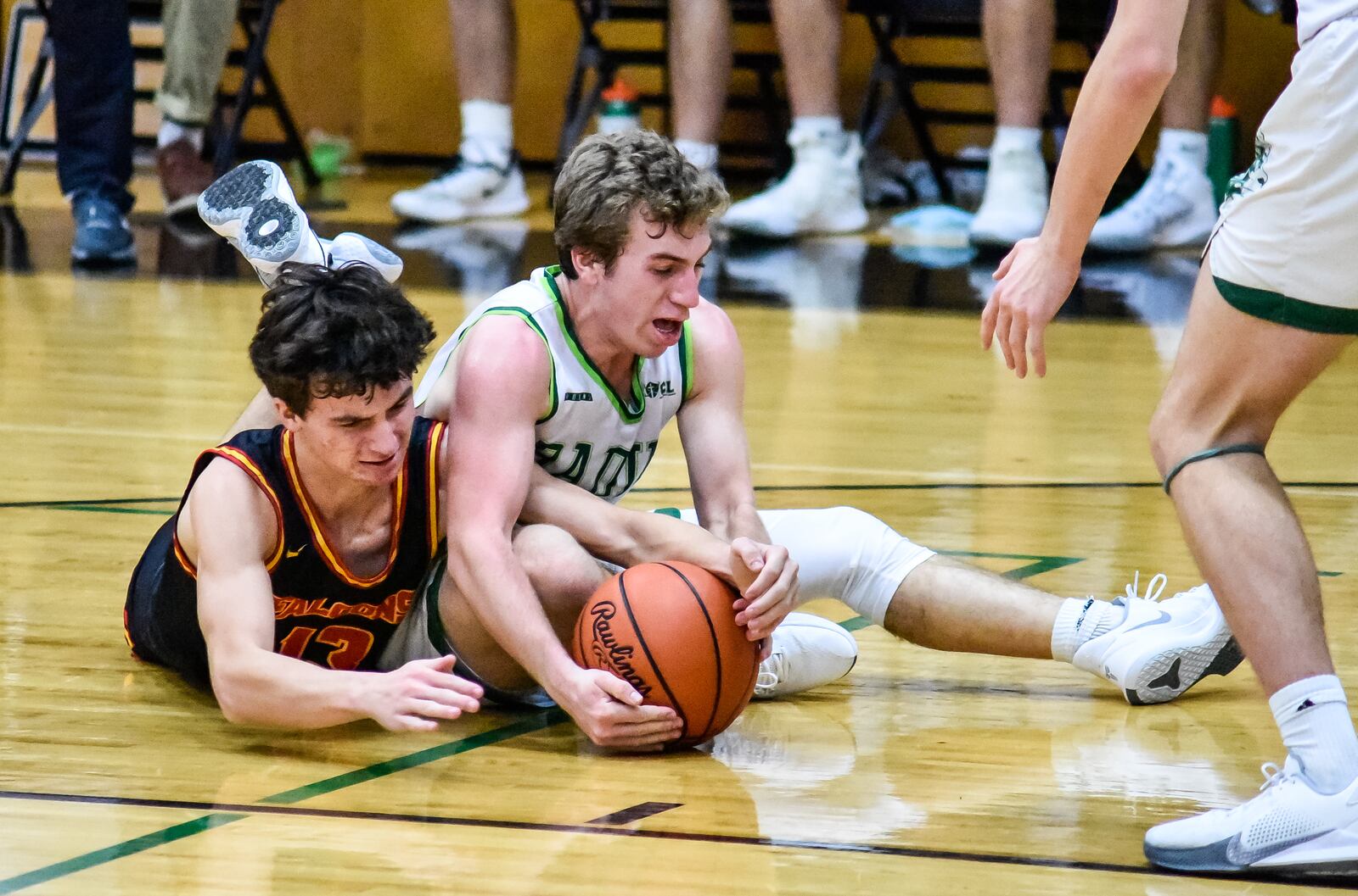 Fenwick's Wes English, left,  battles Badin's AJ Enginger for the ball during their basketball game Friday, Dec. 11, 2020 at Badin High School in Hamilton. Badin won 55-45. NICK GRAHAM / STAFF