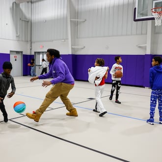 A crowd of supporters gathered for a ribbon cutting and tour of the completed expansion of the Robert "Sonny" Hill Jr. Community Center Wednesday, Dec. 17, 2025 in Middletown. NICK GRAHAM/STAFF