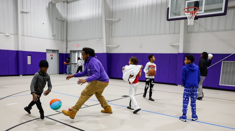 A crowd of supporters gathered for a ribbon cutting and tour of the completed expansion of the Robert "Sonny" Hill Jr. Community Center Wednesday, Dec. 17, 2025 in Middletown. NICK GRAHAM/STAFF