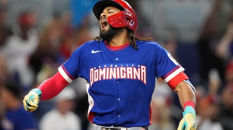 Dominican Republic's Fernando Tatis Jr. reacts after hitting a grand slam during the second inning of a World Baseball Classic game against Israel, Monday, March 9, 2026, in Miami. (AP Photo/Rebecca Blackwell)