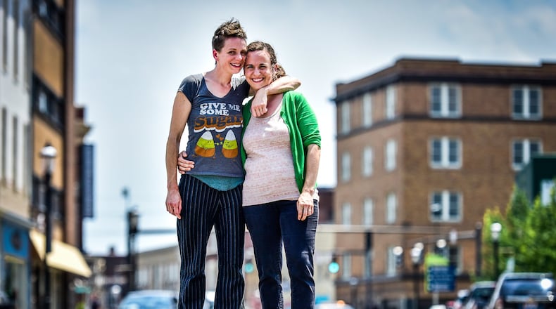 Sisters Jennifer Morrell (left) and Audrey Morrell have painted murals and signage at downtown Middletown businesses, including Gracie’s, Spoken Bicycles, Torchlight Pass, Central Pastry and Society. They have several other projects in the works.
