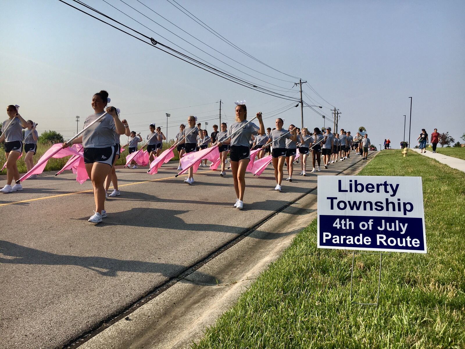 For the first time since 2019 Butler County residents celebrated America's Independence Day holiday in traditional fashion as thousands attended area parades, festivals and evening fireworks. Celebrations were cancelled in 2020 due to public gathering precautions brought on by the coronavirus pandemic. The Marching Thunderhawks of Lakota East paraded through the school's neighboring streets Sunday morning as thousands cheered them on. (Photo By Michael D. Clark\Journal-News)