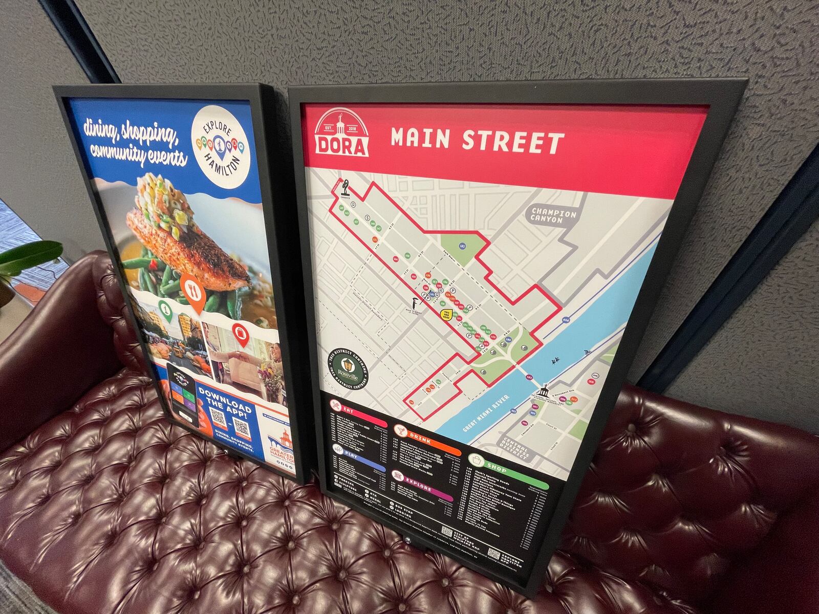 Over the next couple of months, the city of Hamilton will install pedestrian wayfinder signs in about two dozen locations in the city’s urban core. The signs will have three sides to show various amenities including distances to those amenities, around the urban core. Pictured are what will be on two of the three sides. MICHAEL D. PITMAN/STAFF